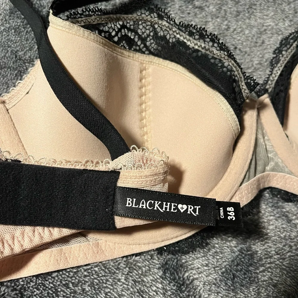 BLACKHEART bra new with partial tags.  Black and nude color. Underwire. 36B